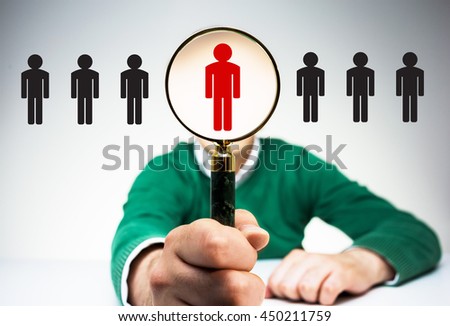 HR manager with magnifier choosing the right employee from variety of condidates. Human resources management and recruitment concept