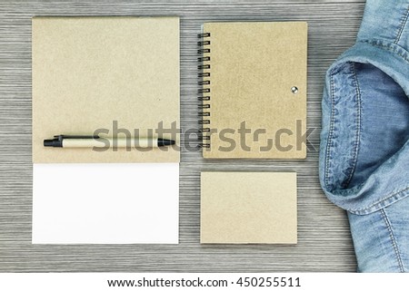 Blue Jeans Shirt and brown paper stationery, Eco-friendly concept. 