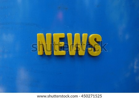 News concept. Yellow letters on background