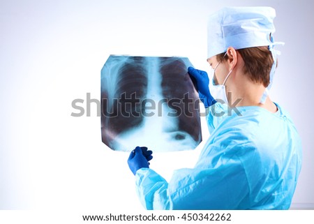 Doctor examining an X-ray of the patient