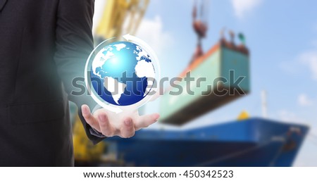 Earth globe in his hands of businessman concept of Industrial Container Cargo freight ship at harbor for Logistic Import Export background (Elements of this image furnished by NASA)