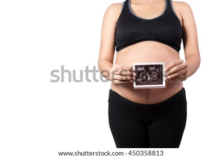 Pregnant woman with Close-up ultrasound baby film - isolated over a white background.copyspace