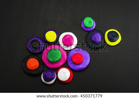 Creative and attractive colored circles spread out on a dark background