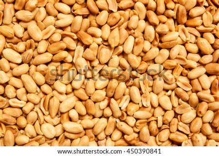 peeled peanuts for background Royalty-Free Stock Photo #450390841