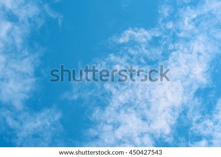 beautiful fluffy cloud on abstract blue sky gradient background