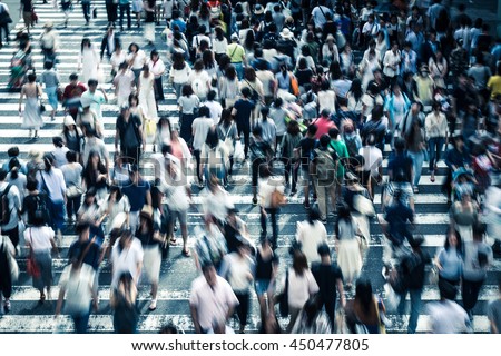 Asian People are across the crosswalk Royalty-Free Stock Photo #450477805