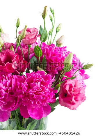 Bright pink peony and eustoma flowers bouquet in blue pot isolated on white background
