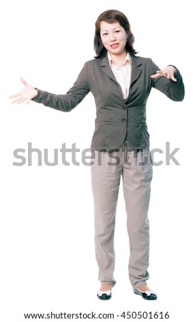Young woman gesticulating cutout picture in dark-grey jacket with a white shirt. Full length portrait isolated on white background.