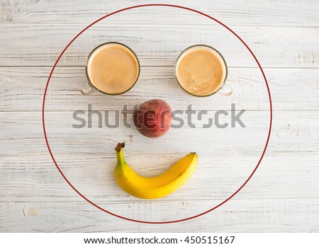 


Sliced tasty chocolate and fruit cake with double cup of coffee on wooden table background
