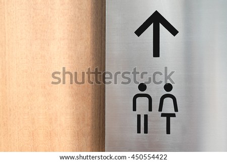 man and lady toilet sign symbol  on steel background
