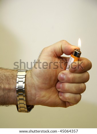 Cigarette lighter over white backdrop. This image has been converted from a RAW-format.