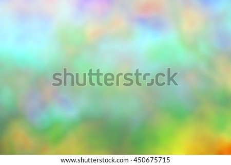 Abstract blurred rainbow colourful bokeh background with circular lights 