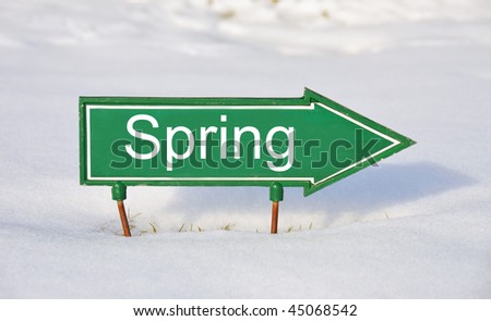 SPRING sign in snow