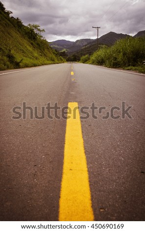 empty brazilian road at the cloudy day

