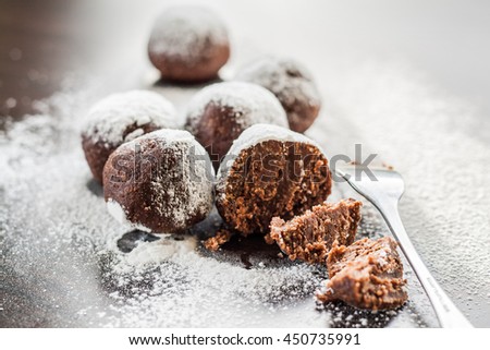 cake truffle potatoes sprinkled with powdered sugar.