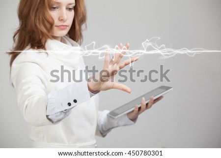 Woman making magic effect - flash lightning. The concept of electricity, high energy.