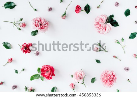 round frame wreath pattern with roses, pink flower buds, branches and leaves isolated on white background. flat lay, top view Royalty-Free Stock Photo #450853336