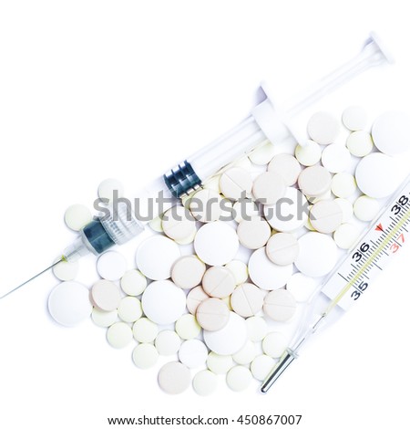 Medicine pills or capsules with syringe and thermometer on white background. Drug prescription for treatment medication. Pharmaceutical medicament, cure. Flu, temperature.