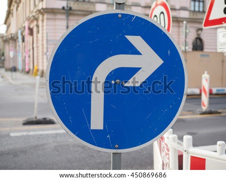 Regulatory signs,  Turn right ahead traffic sign Royalty-Free Stock Photo #450869686