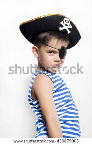 Little  boy 5-6 years old  wearing a pirate costume. White background
