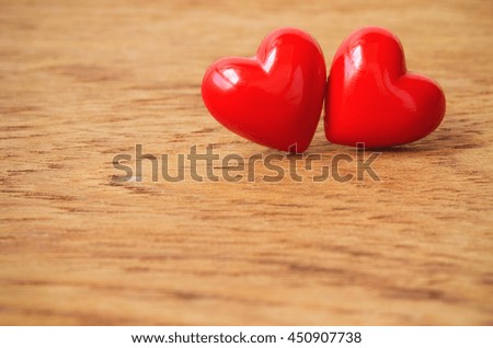 Red hearts on wooden background, heart for you, heart background.
