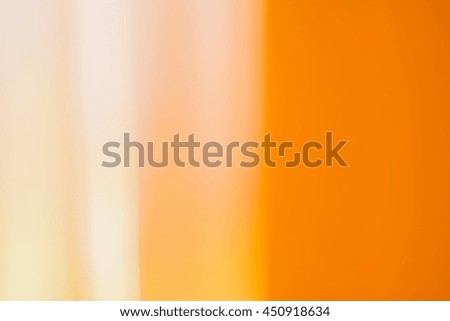 Abstract blurry soft background. Over white and orange tones.