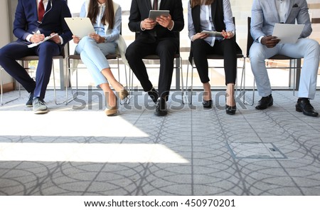 Stressful people waiting for job interview Royalty-Free Stock Photo #450970201