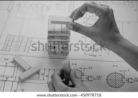 Architect working on blueprint
