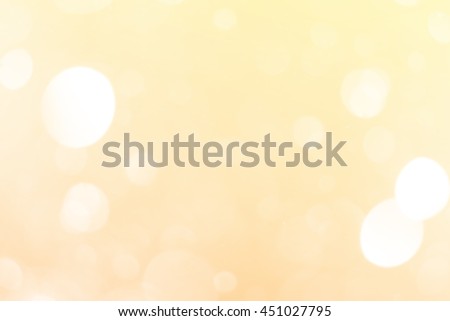 soft gold blurred light bokeh background, copyspace in central of image for business presentation background or wallpaper