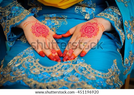 Bride henna carved beautiful and unique at bride's hand. Selective Focus And Shallow DOF.