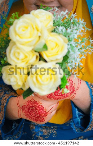 Wedding flowers, Woman holding colorful bouquet with her hands on wedding day Selective Focus And Shallow DOF