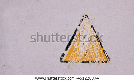High voltage erased warning sign mounted on gray metal wall