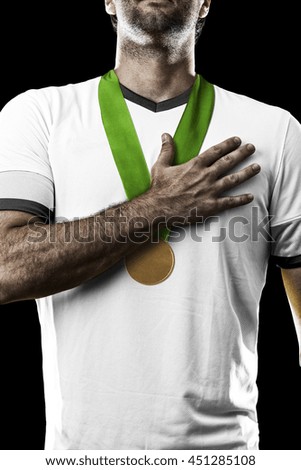 German Athlete Winning a golden medal on a black Background.