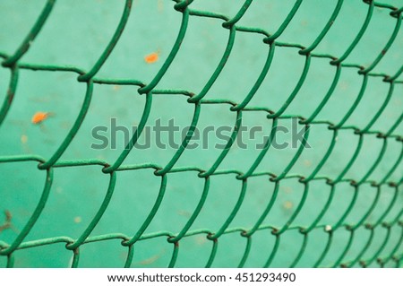Green fence with green ground for protection