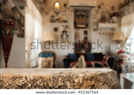 Empty wooden table space platform and blurred resturant or coffee shop background for product display montage