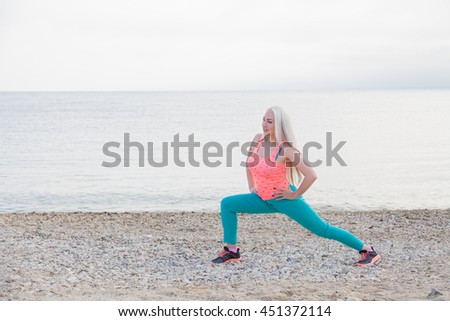 pretty girl playing sports on the beach