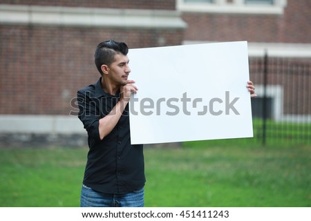 advertising man with a white board on hands, male student poster ad