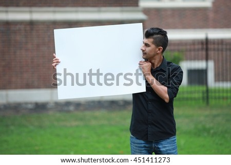 advertising man with a white board on hands, male student poster ad