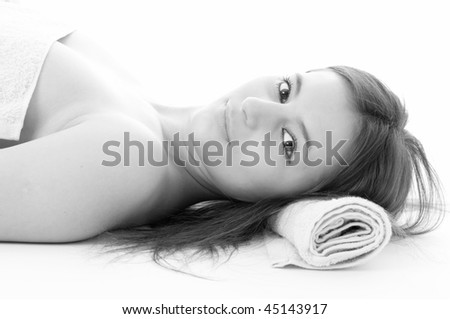 spa woman in blue towel on white background