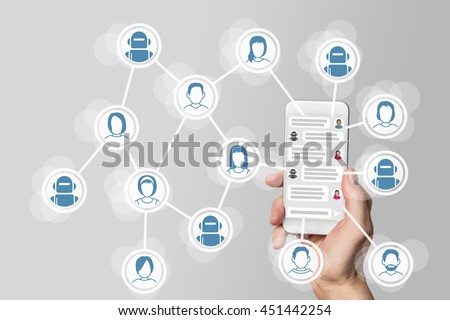 Chatbot concept with instant messenger displayed on smart phone Royalty-Free Stock Photo #451442254