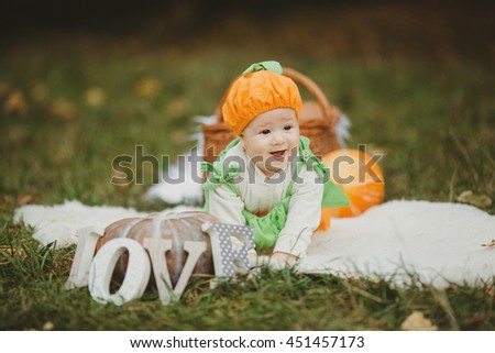 beautiful little baby crawling on white tablecloth