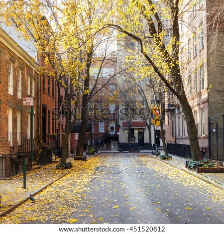 Fall street scene in the historic Greenwich Village neighborhood of Manhattan, New York City Royalty-Free Stock Photo #451520812