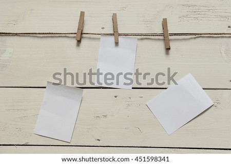 Note pad pinned on string