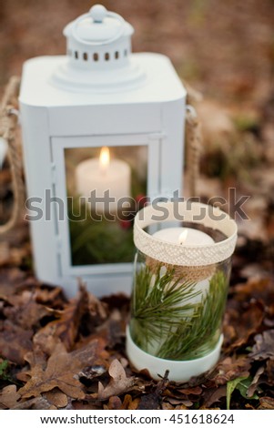 lantern with candle with spruce branch