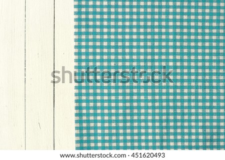 Blue Checkered Tablecloth On The Table.
