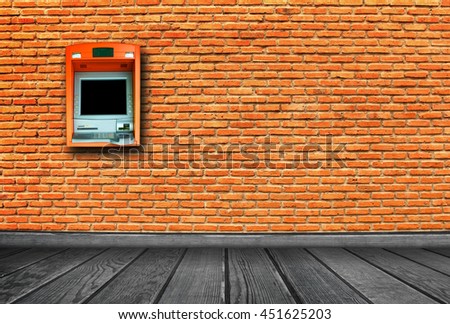 ATM machine on wall background.