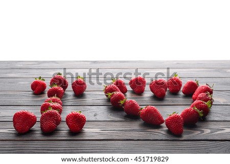 words i love you lettered with fresh organic strawberry.