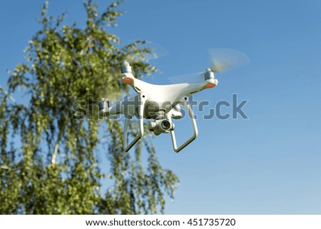 quadrocopters flying on a sunny day