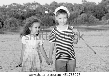 couple, funny boy and girl summer portrait of friend.Black and white toned photo stylized vintage style
