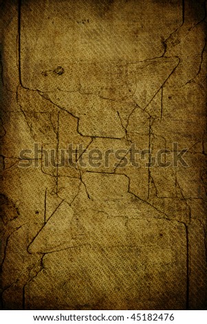 Brown torn dry grunge background with clefts and dark borders